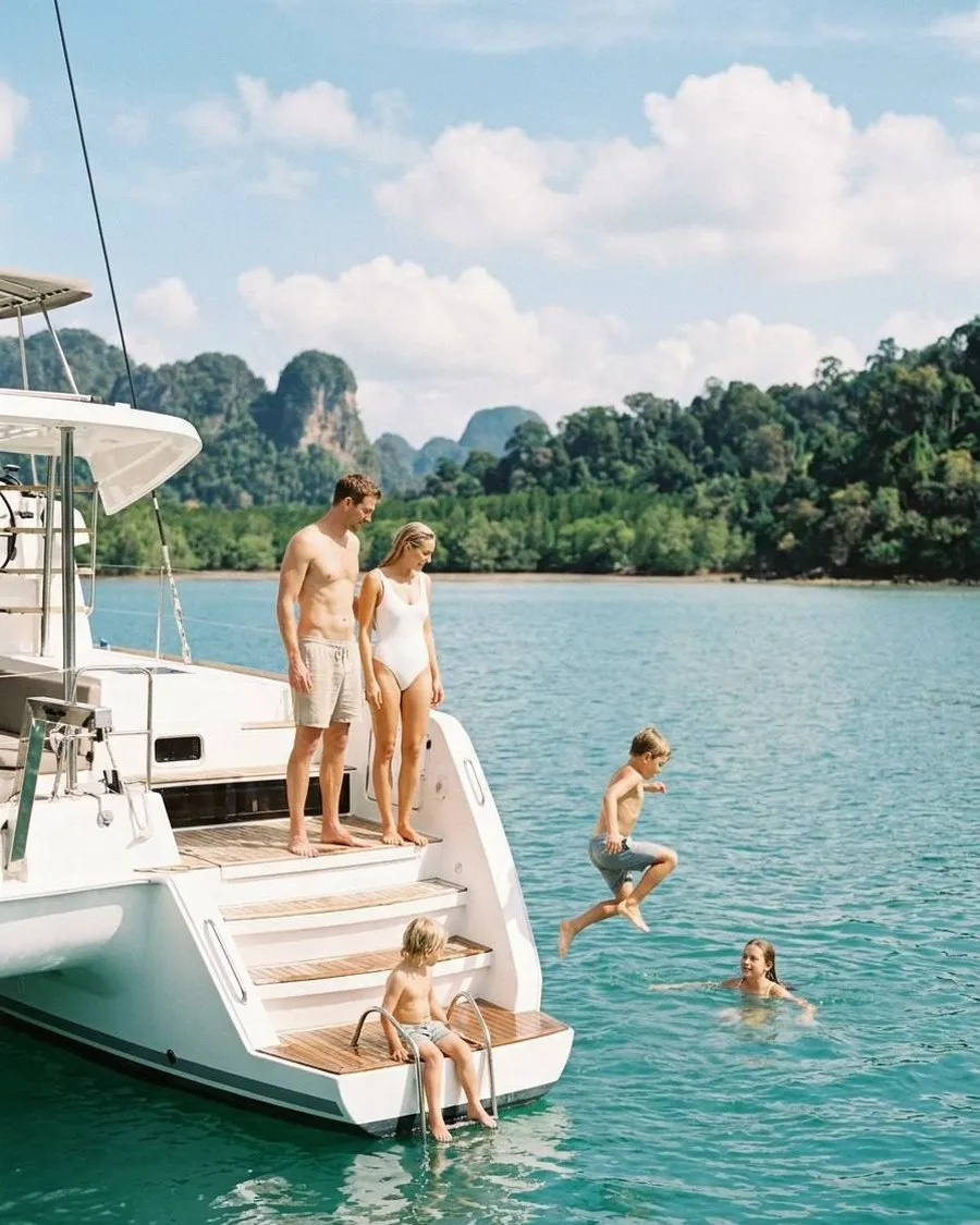 Guests relaxing and swimming from a Star Sailing yacht