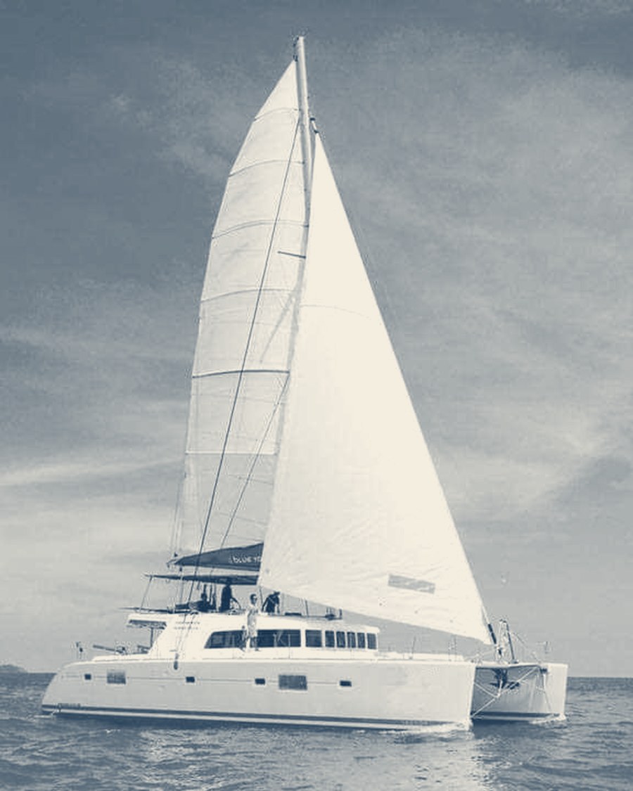 Sailing catamaran under full sail off Phuket